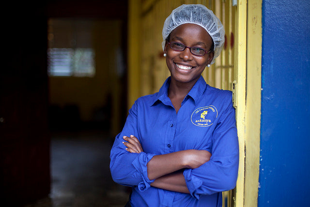 Founder Corinne at the chocolate making factory in Haiti 